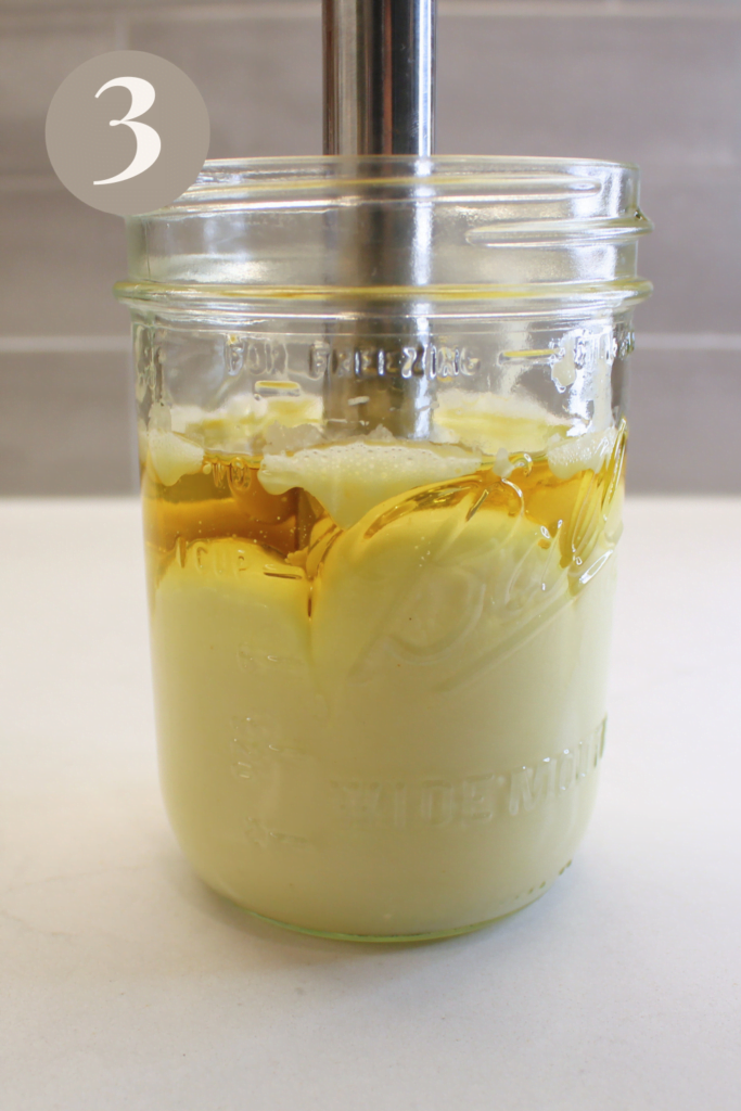 Finished blending of ingredients in mason jar with immersion blender.