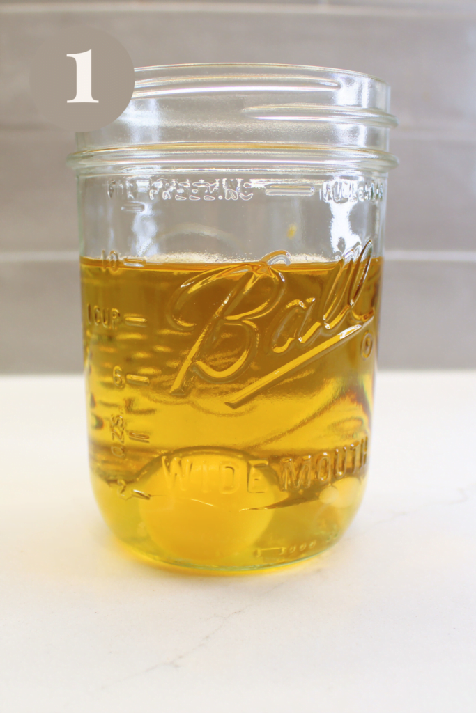 Mayo Ingredients placed into mason jar.