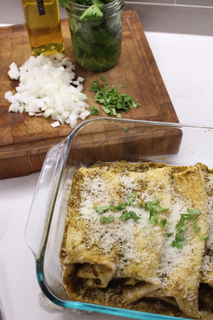 Green enchilada pan with cilantro garnish.