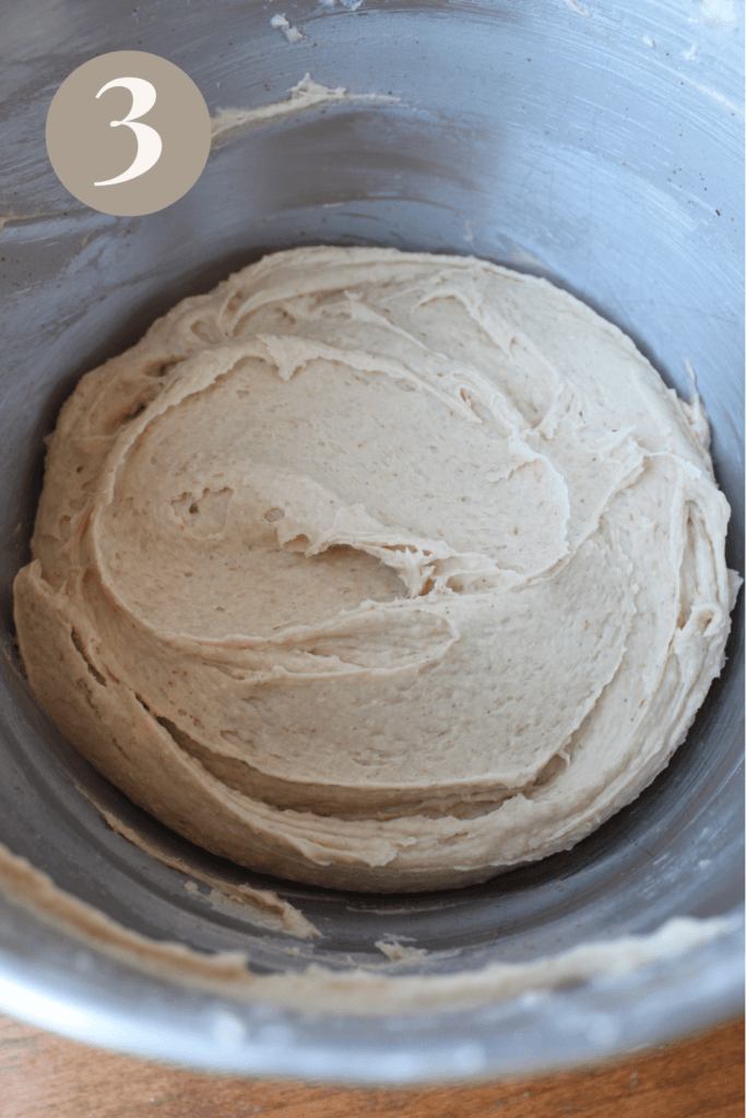 Gluten free bread wet and dry ingredients mixed together in a bowl.